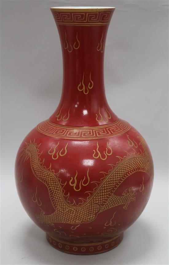 A Chinese red ground dragon vase